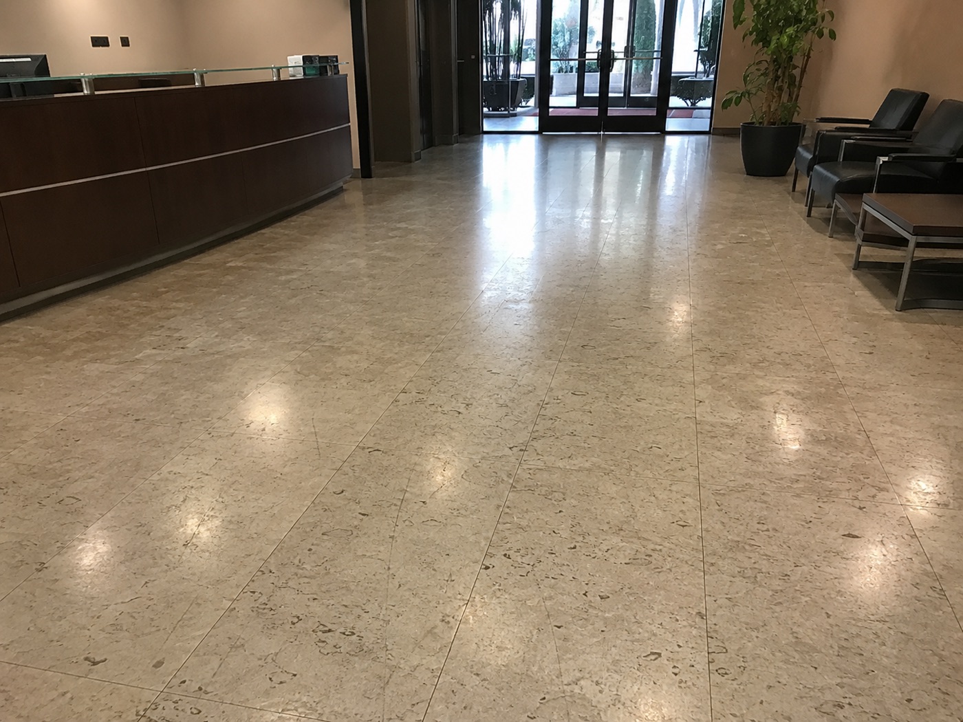 Before service - dull, scuffed lobby floor